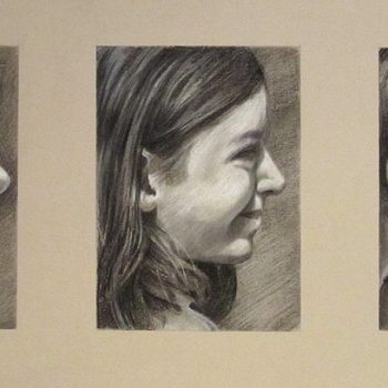 Three profile portrait commissions of children in white chalk and charcoal